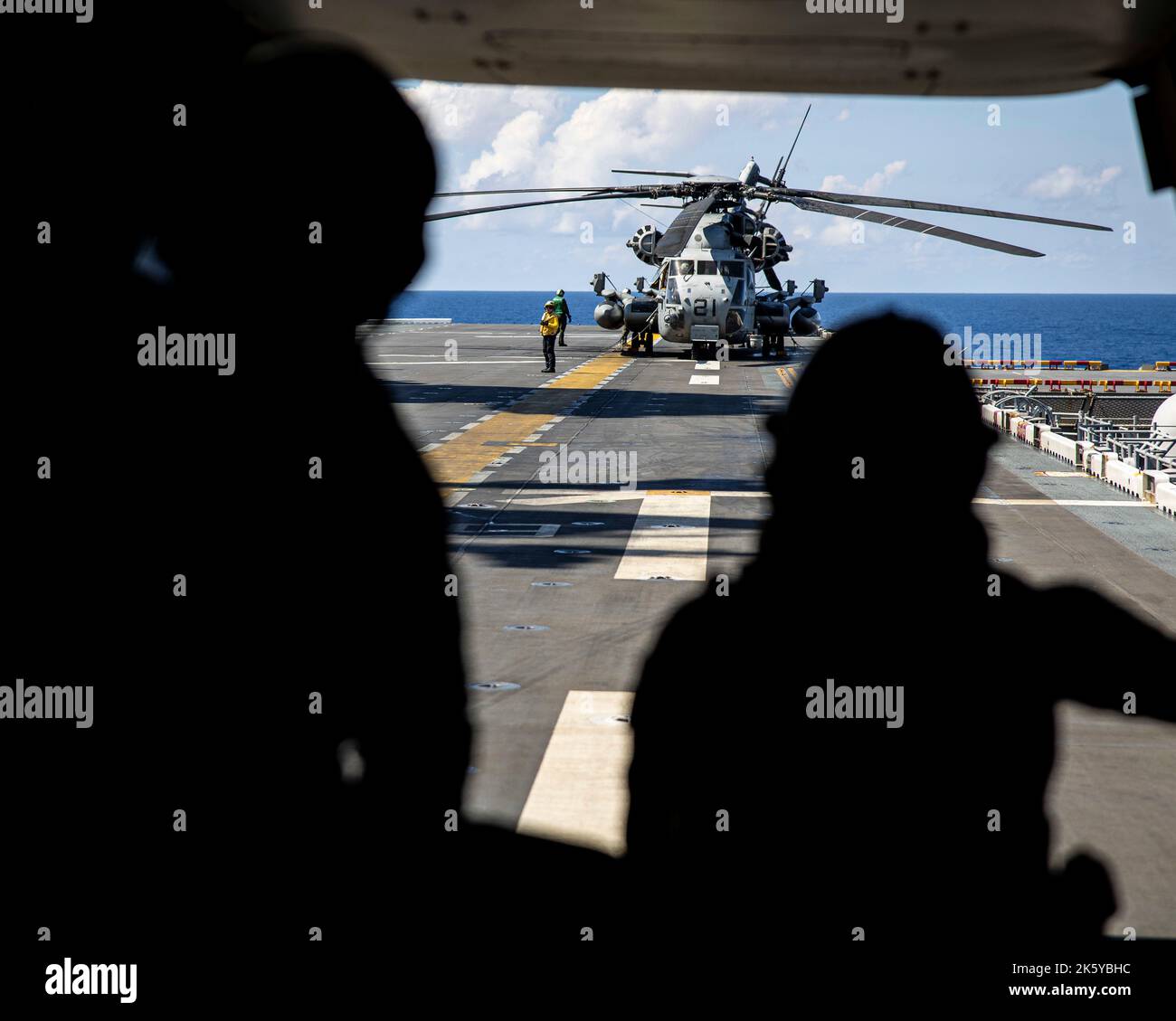 U.S. Marines with Marine Medium Tiltrotor Squadron (VMM) 262 (Rein.), 31st Marine Expeditionary Unit, prepare for flight operations inan MV-22B Osprey during KAMANDAG 6 aboard Amphibious Assault Ship USS Tripoli (LHA-7), off the coast of the Philippines, Oct. 2, 2022.  KAMANDAG is an annual bilateral exercise between the Armed Forces of the Philippines and U.S. military designed to strengthen interoperability, capabilities, trust, and cooperation built over decades shared experiences. (U.S. Marine Corps photo by Sgt. Danny Gonzalez) Stock Photo