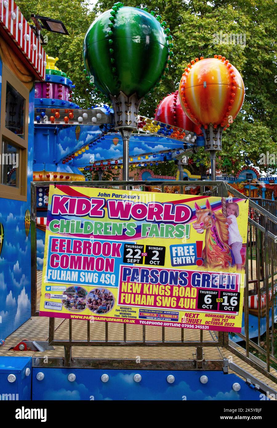Multi-coured balloons at fairground at Parsons Green, West London, UK ...