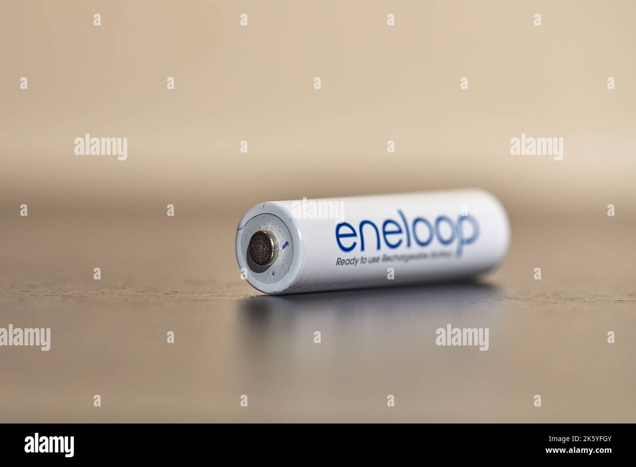 1 5 volt aa battery in hand stock photo alamy