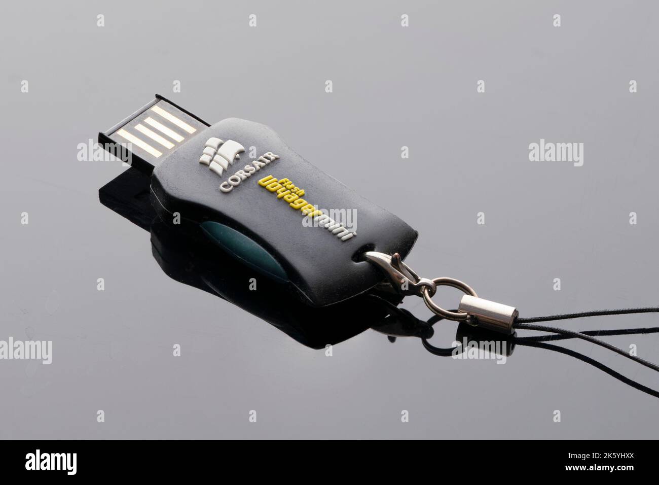 usb flash drive for computer folding on a black background close-up Stock Photo