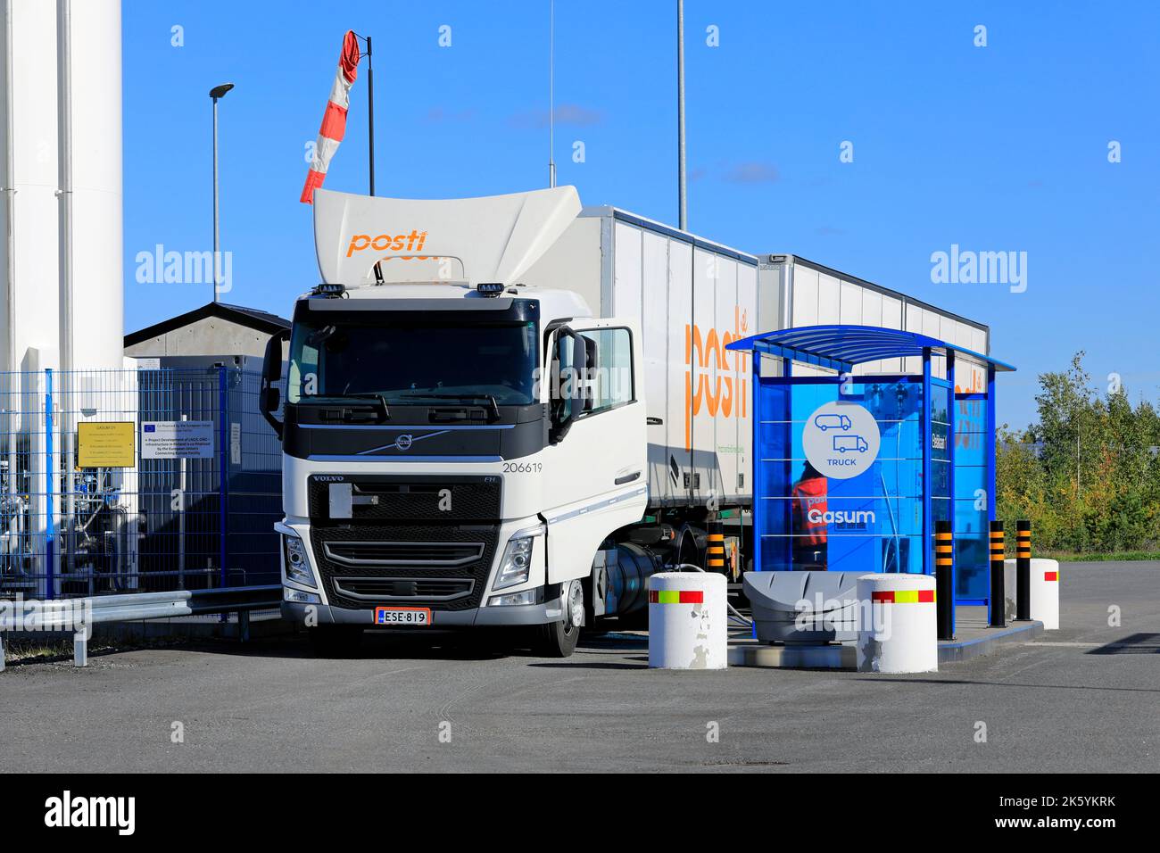 Gas-powered Volvo FH freight truck of Posti Group Oyj at Gasum LNG and LBG gas filling station for heavy transport in Lieto, Finland. Sept 22, 2022. Stock Photo