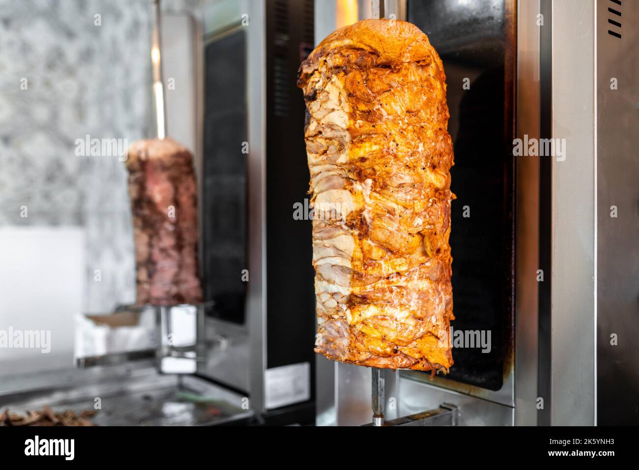 Traditional Turkish fast food, Vertical rotisserie with chicken and