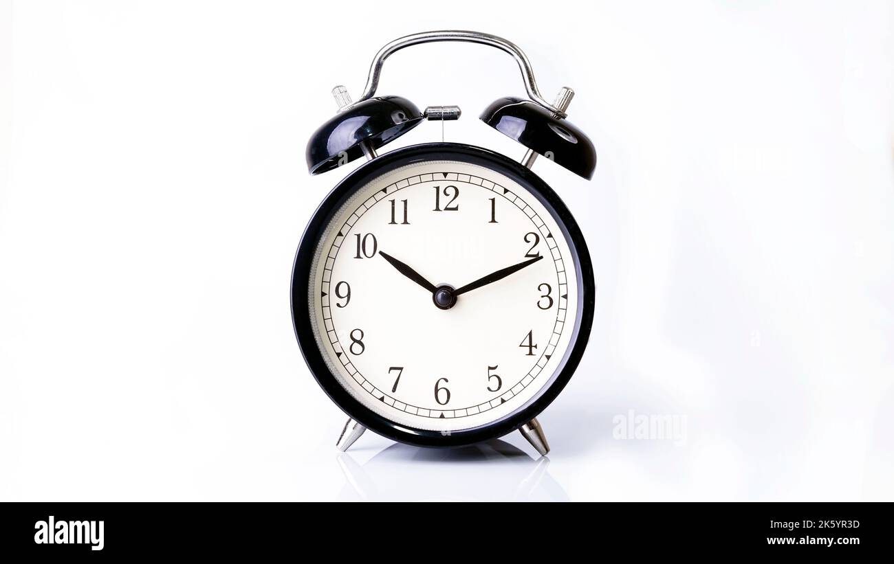 Black Alarm clock isolated on white background Stock Photo - Alamy