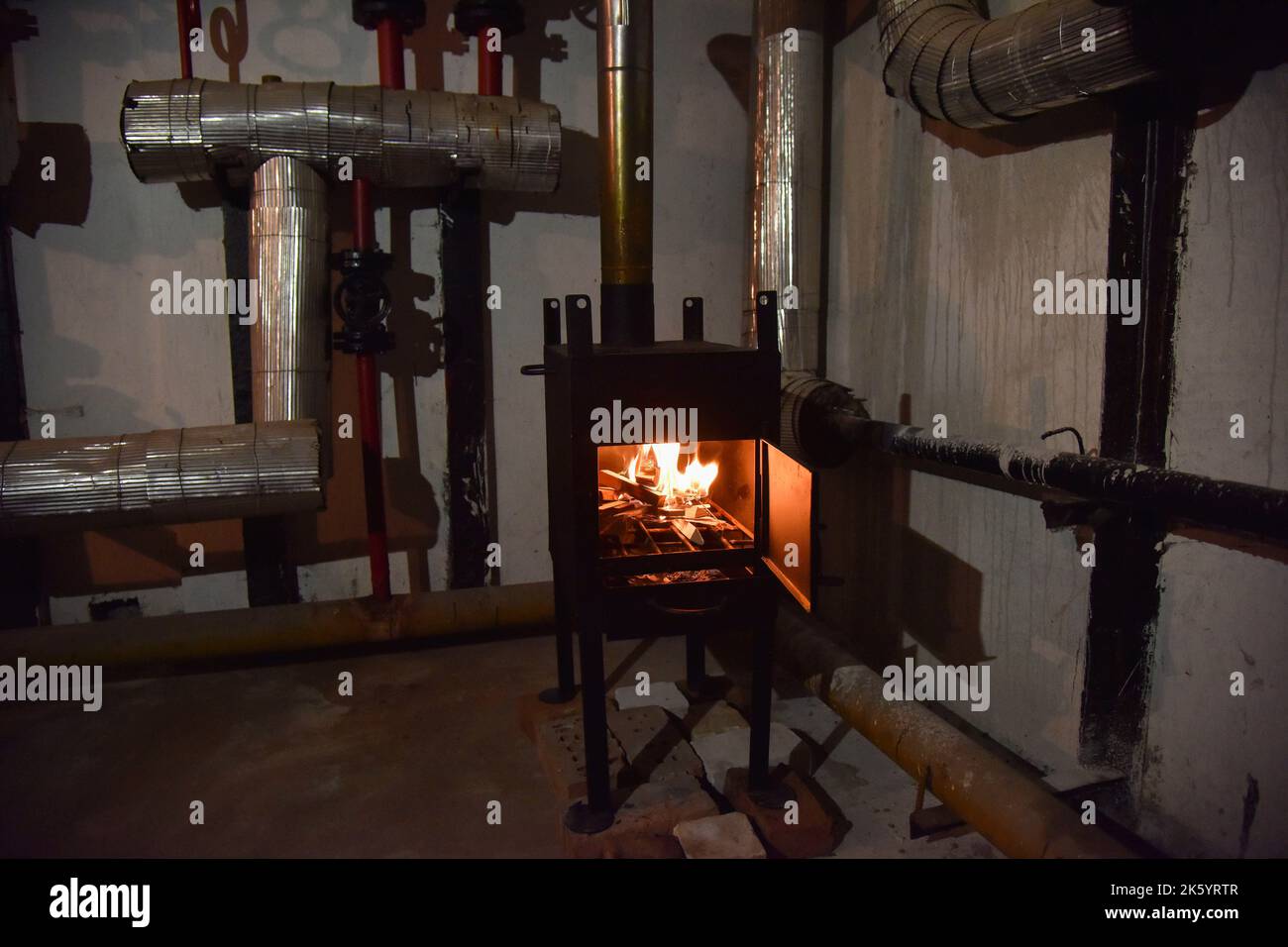 Lviv, Ukraine. 30th Sep, 2022. A metal stove seen in the basement of a
