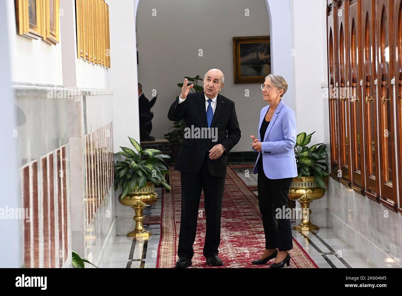 (221011) -- ALGIERS, Oct. 11, 2022 (Xinhua) -- Algerian President Abdelmadjid Tebboune (L) welcomes French Prime Minister Elisabeth Borne in Algiers, Algeria, Oct. 10, 2022. (Algerian Presidency/Handout via Xinhua) Stock Photo