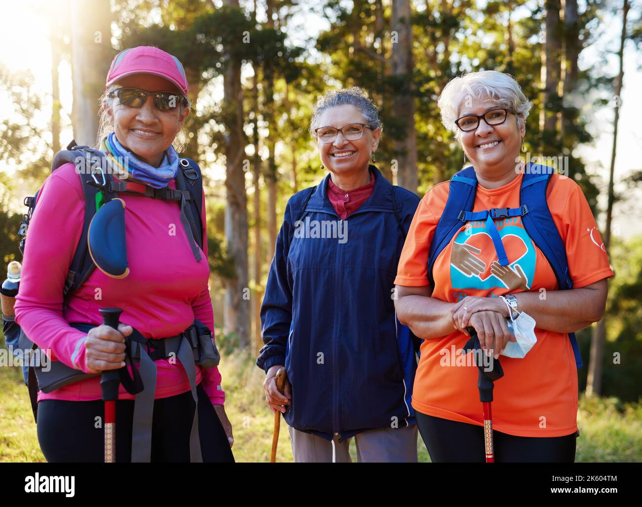 senior-women-portrait-smile-and-hiking-or-trekking-together-on-an