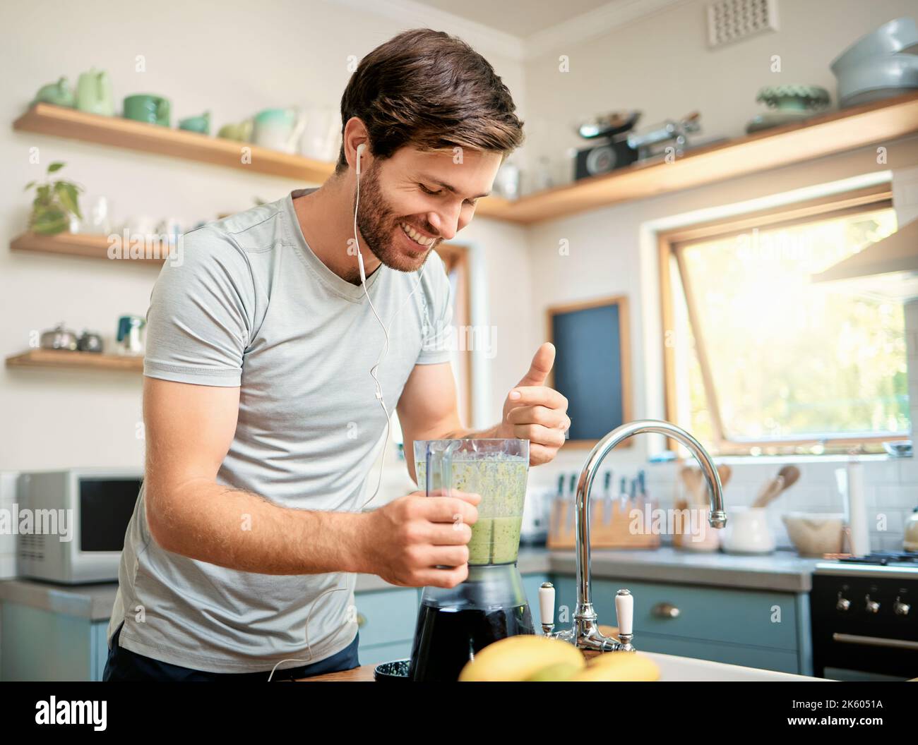 Man using blender in kitchen hires stock photography and images Alamy