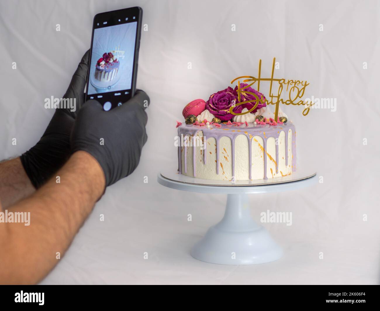 romantic purple frosting happy birthday cake by designer Stock Photo ...