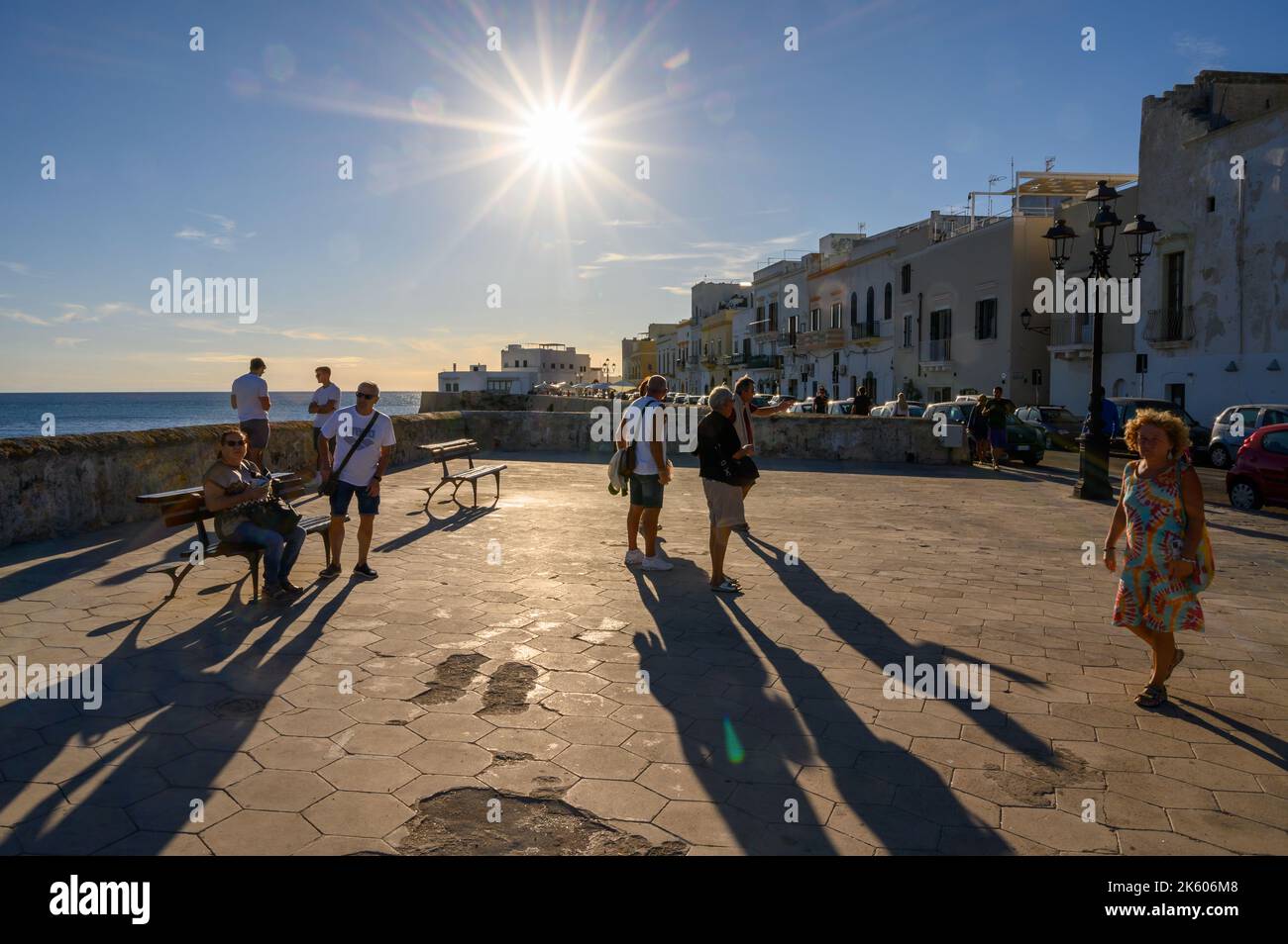 People enjoying the late afternoon sunshine by Riviera Armando Diaz in ...