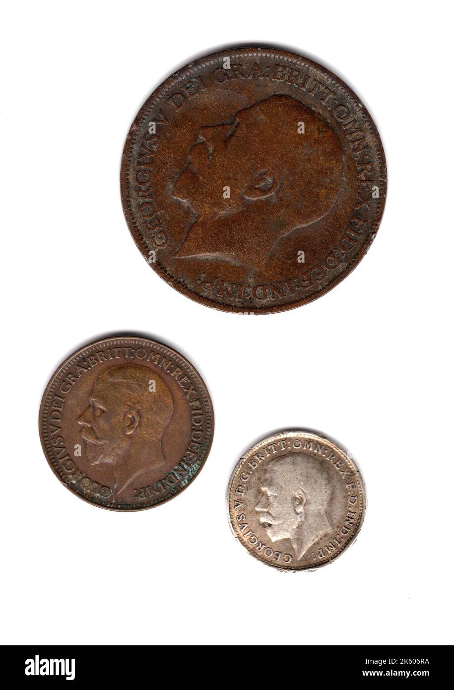A mixture of vintage Great Britain coins featuring King George V. Stock Photo