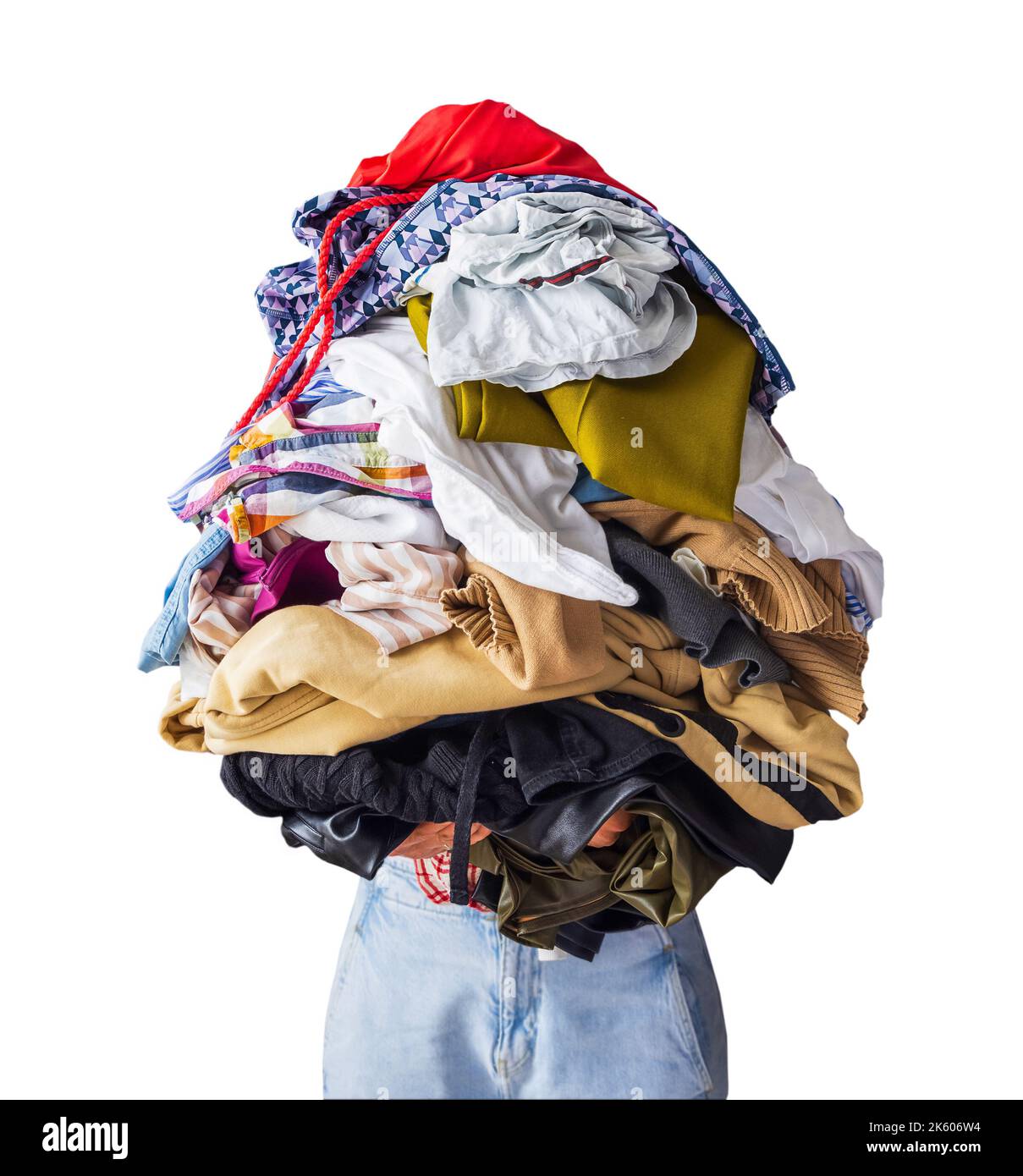 woman holding a lot of crumpled clothes in her hands, isolated object copy-paste Stock Photo