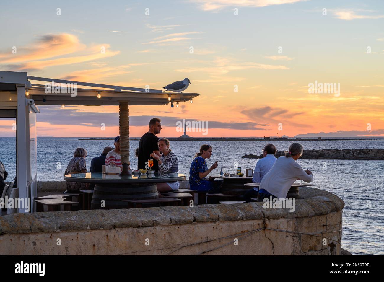 People enjoying food and drinks at Buena Vista outdoor restaurant on