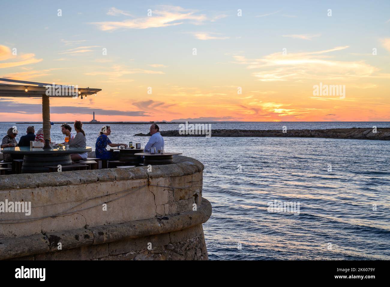 People enjoying food and drinks at Buena Vista outdoor restaurant on
