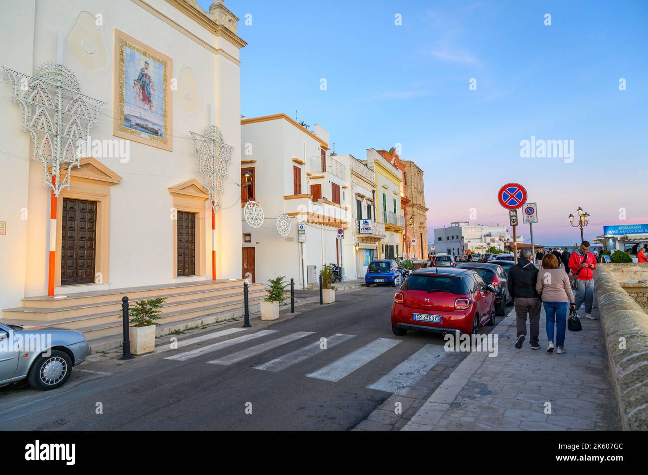 Street scene in warm evening light along Riviera Sauro by the