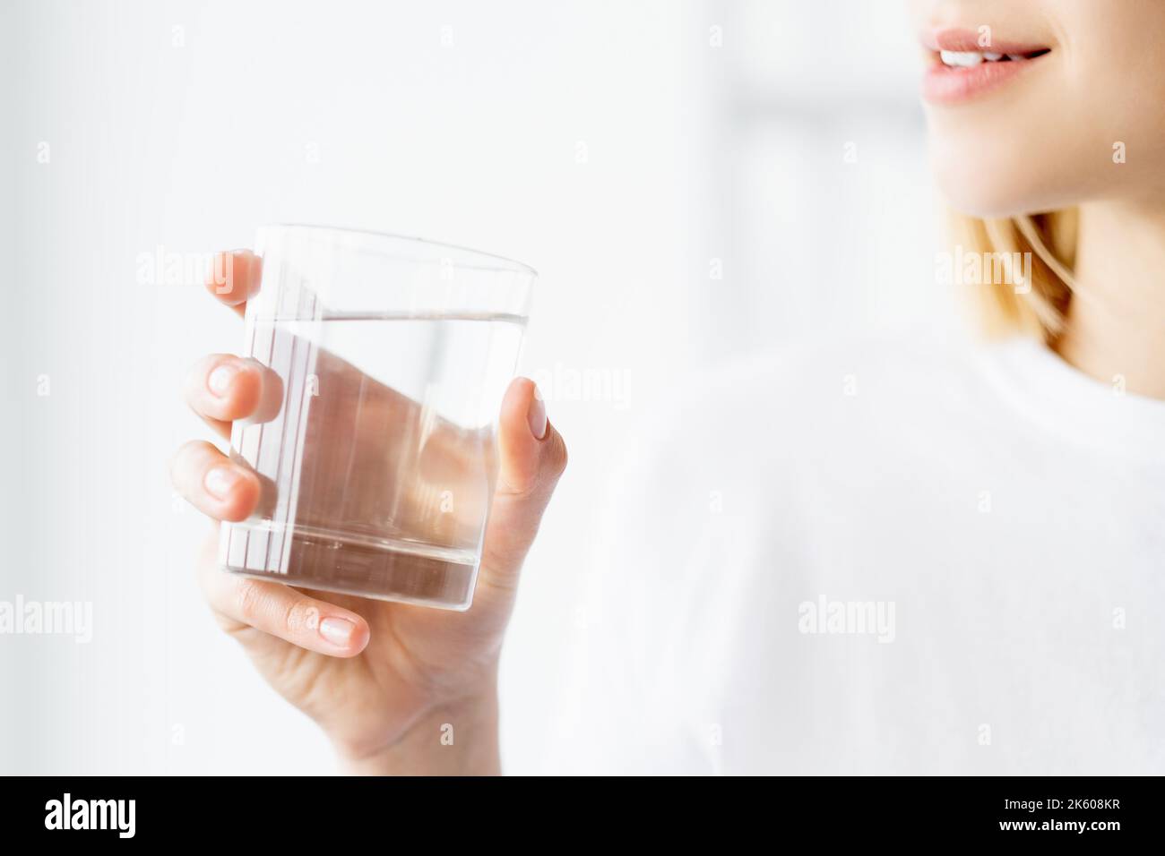 water hydration aqua balance woman hand glass Stock Photo