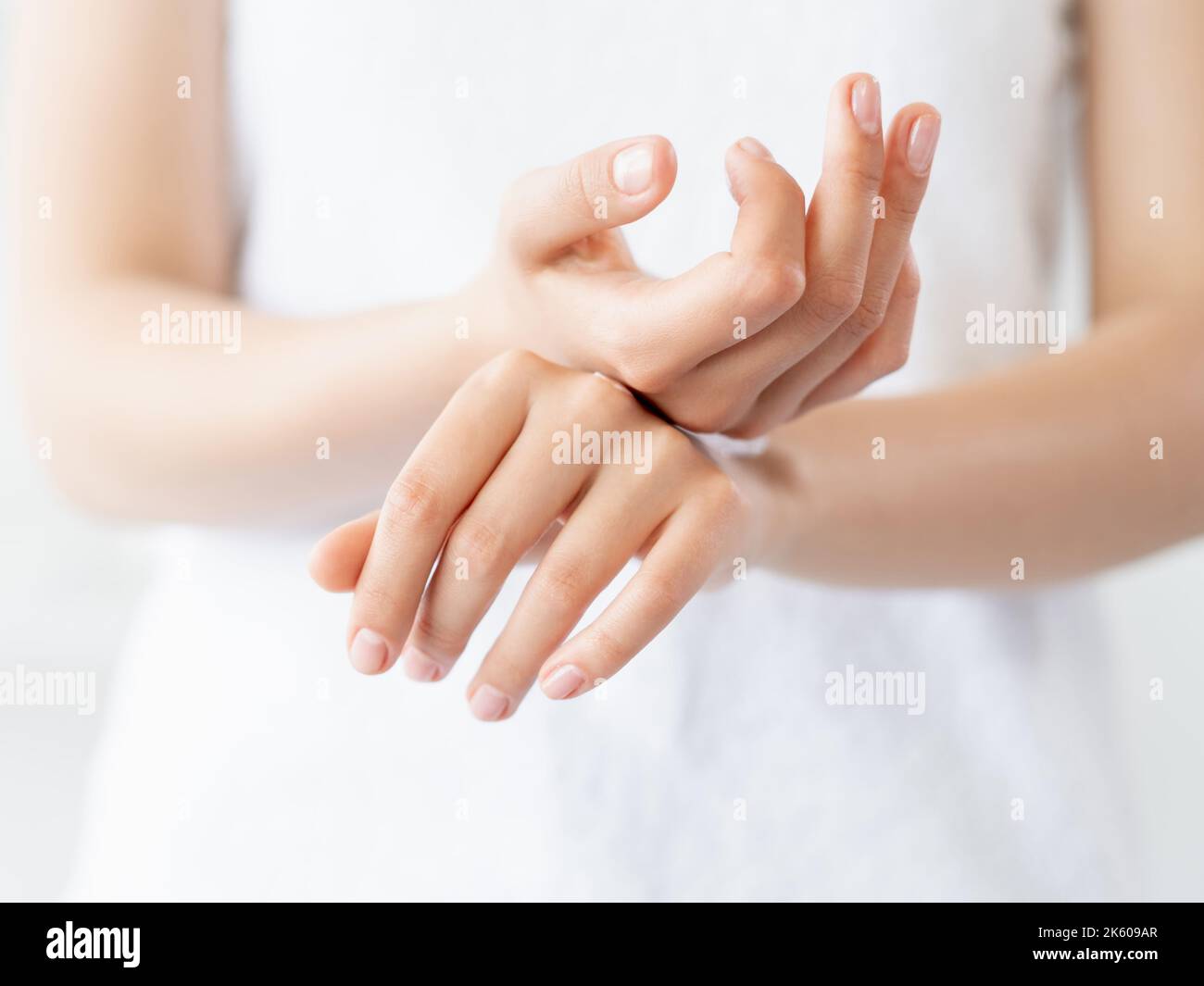 hand skincare moisturizing cosmetology woman cream Stock Photo