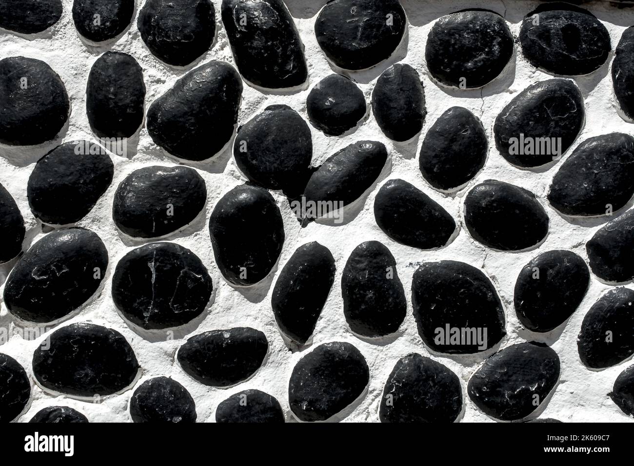 Wall closeup hand construction stones texture Stock Photo