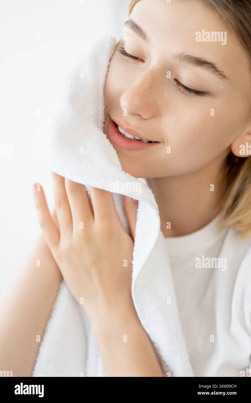 skincare cleansing morning treatment woman face Stock Photo