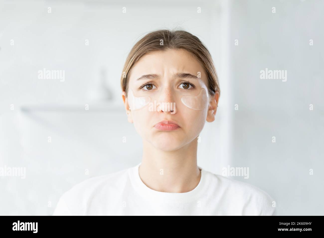 cosmetics allergy sensitive skin sad woman face Stock Photo