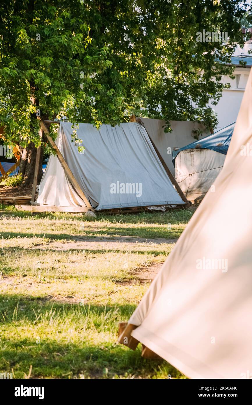 Camping zone. Close nature. Enjoying rest. Cozy canvas tents on