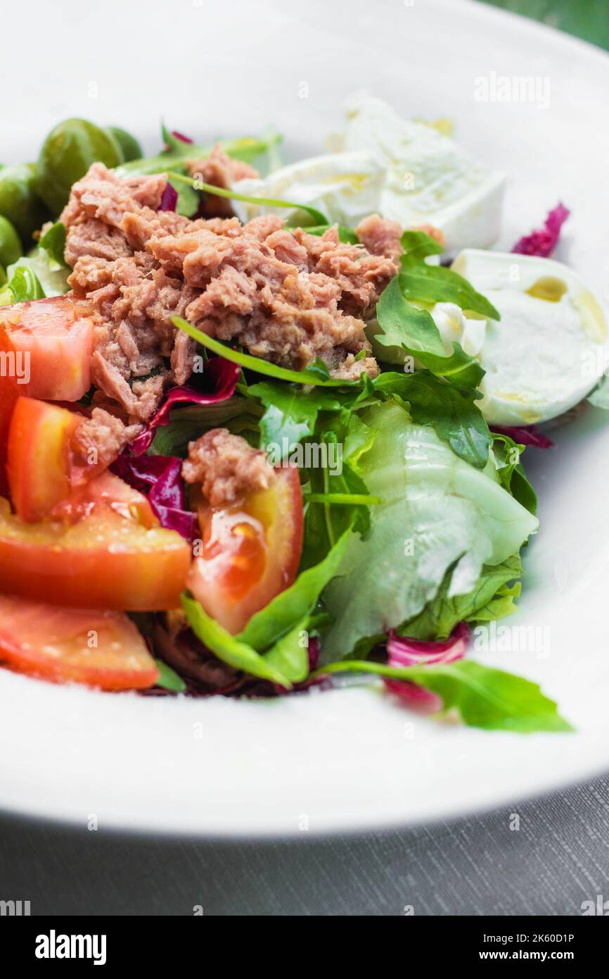 Tuna salad with veggies and eggs, selective focus Stock Photo