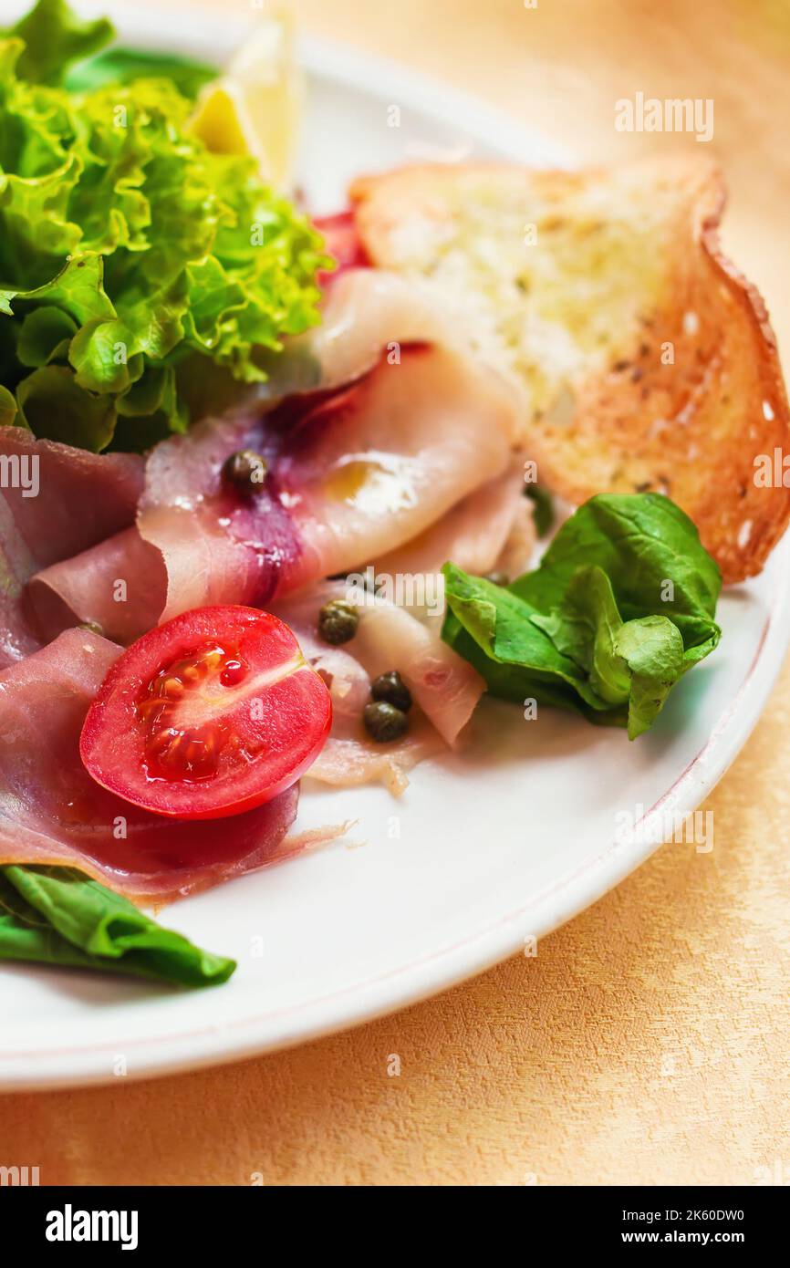 Assortment of smoked fish and rusk  (selective focus) Stock Photo