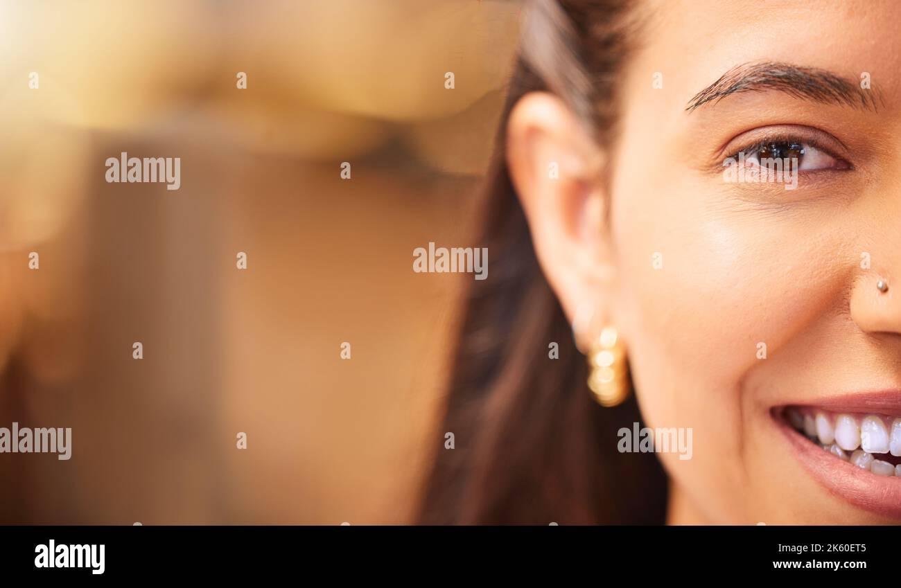 Closeup portrait of a young mixed race woman smiling and looking happy