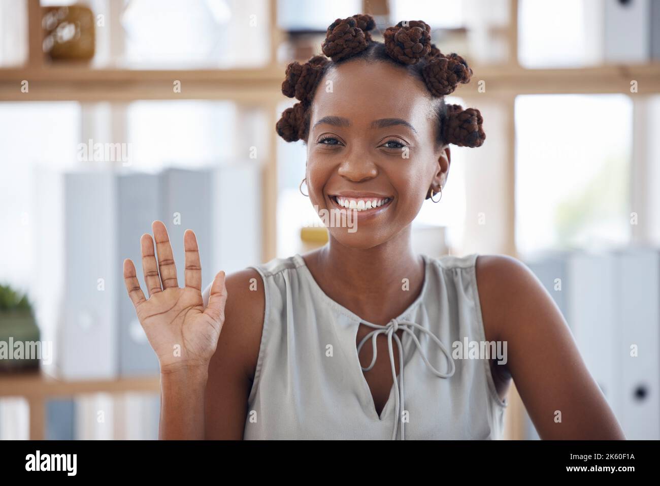 Portrait cheerful african businesswoman waving hi-res stock photography ...