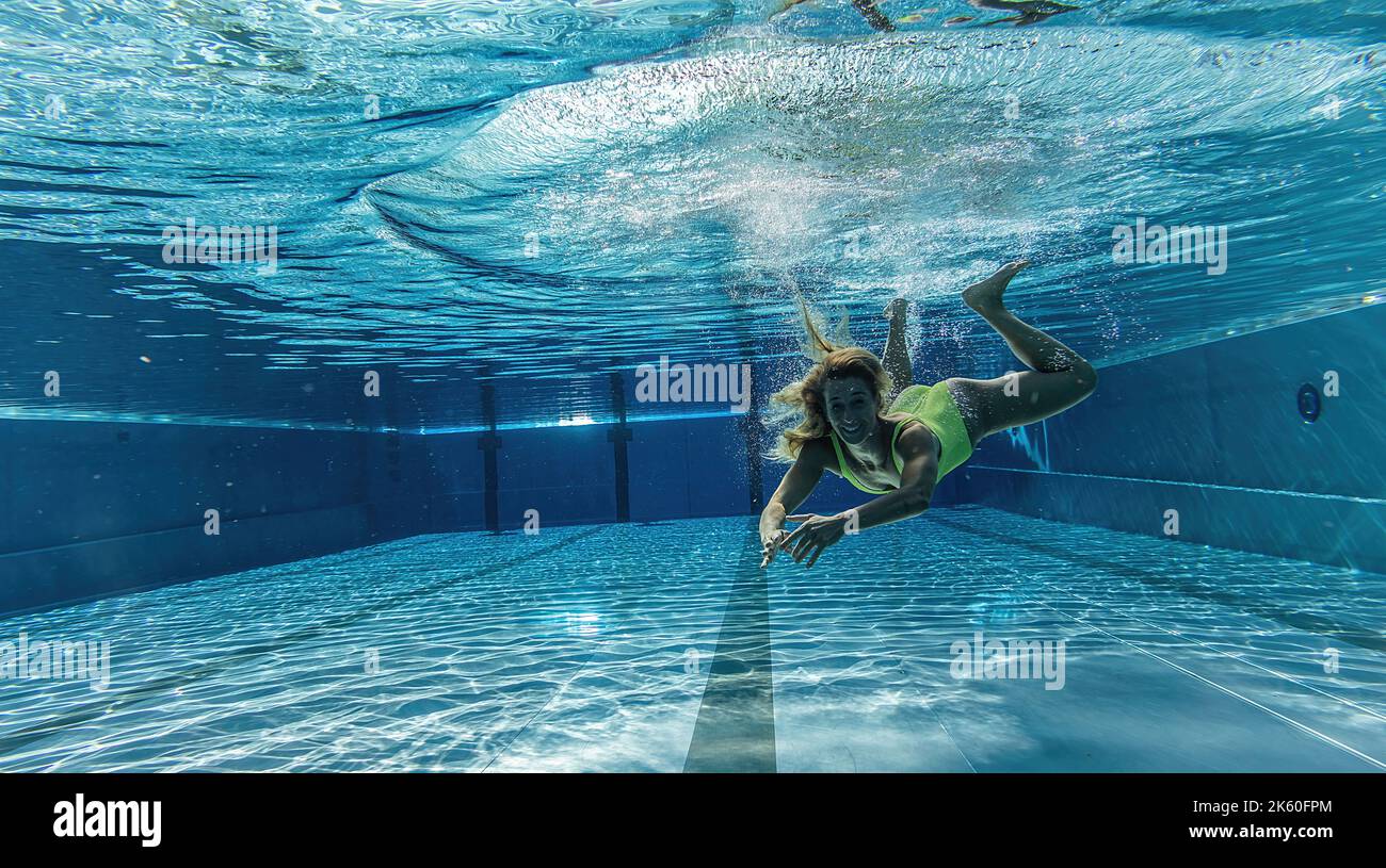 Underwater woman portrait in swimming pool Stock Photo - Alamy