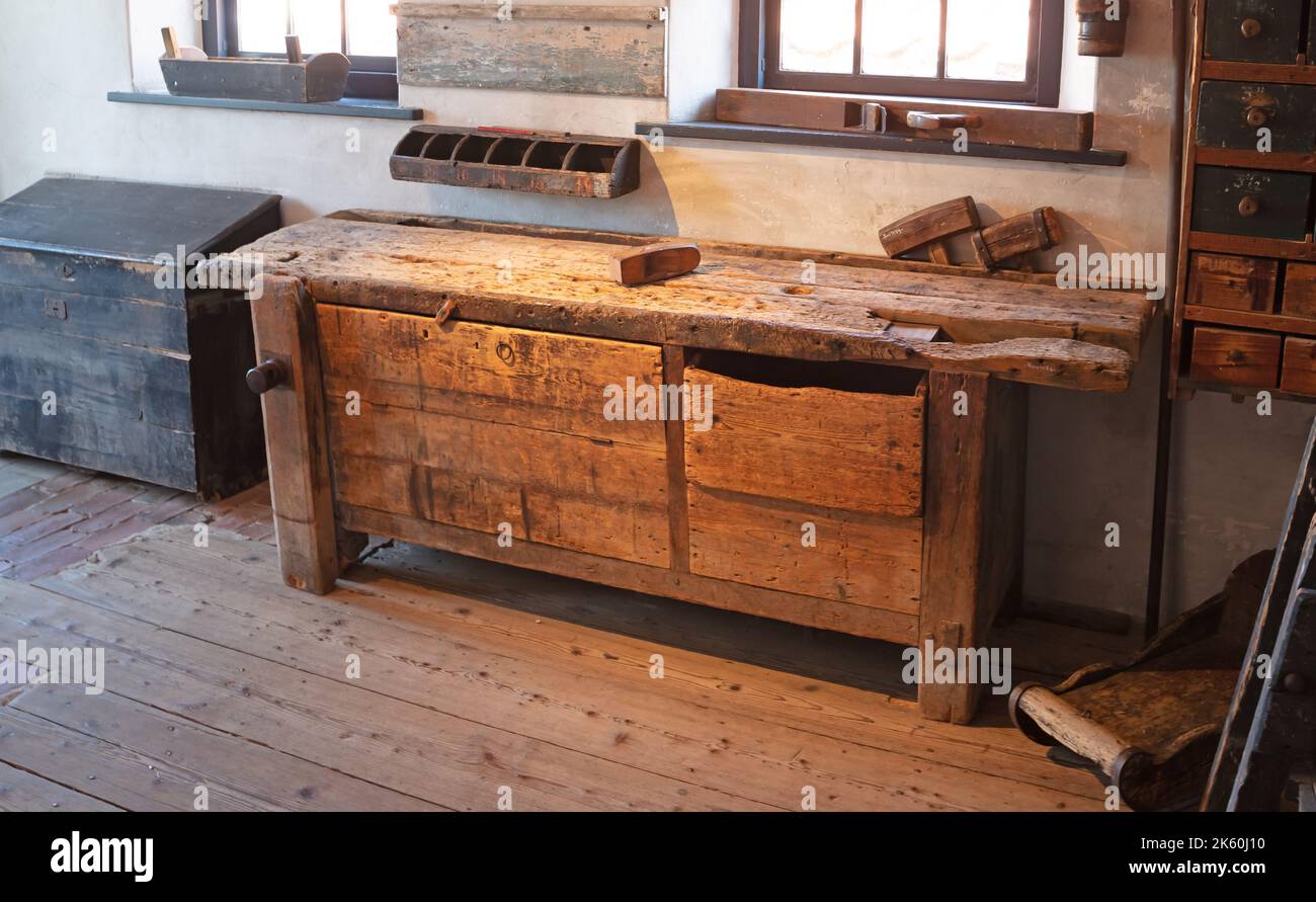 Old woodworkers shop with a vintage woodworkers bench Selective focus