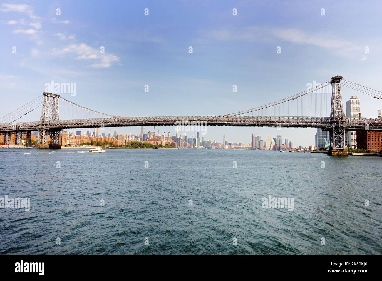The Williamsburg Bridge on the East River in New York City Stock Photo