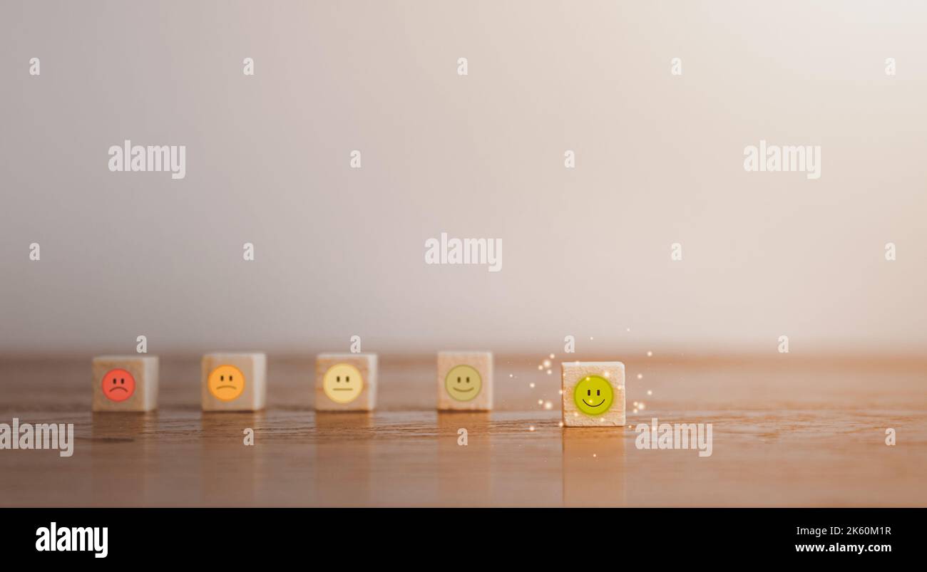 Smiley face rating on wood block square customer service evaluation