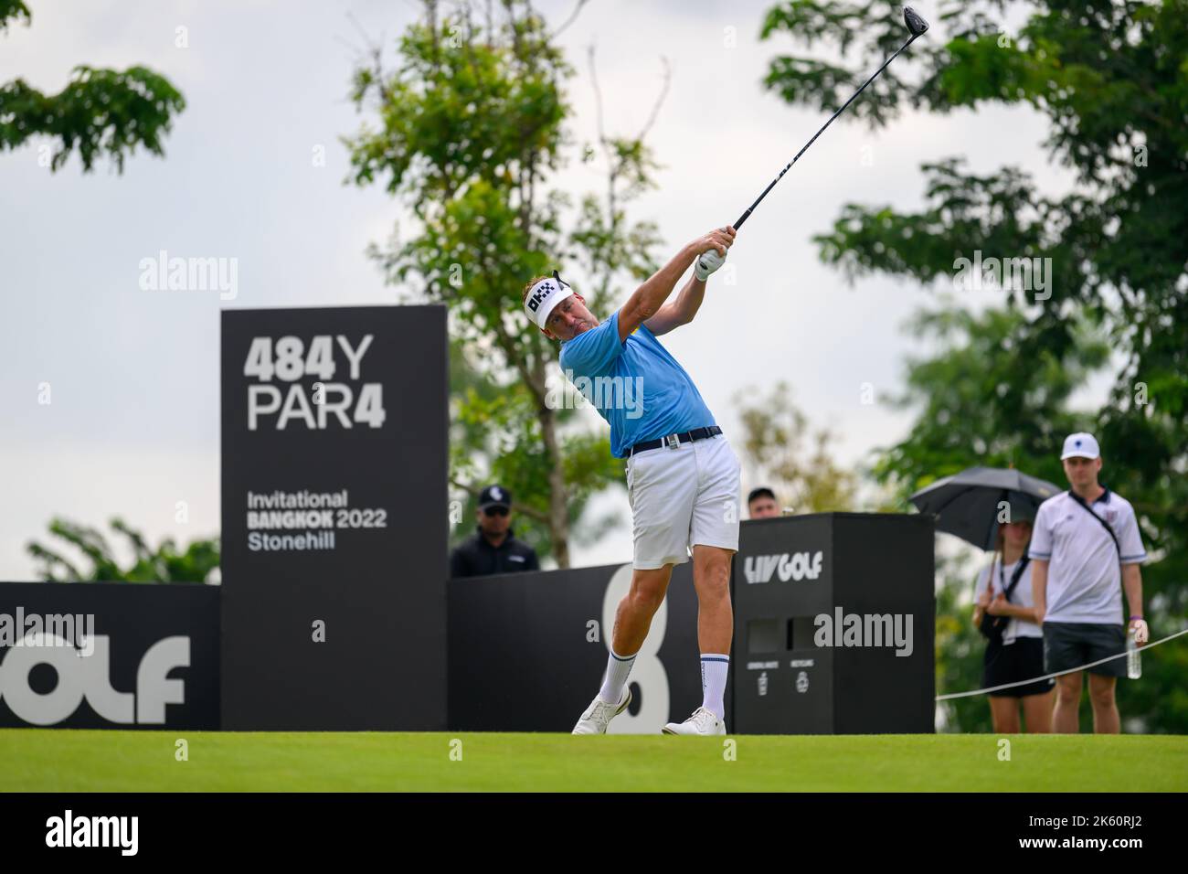 Ian Poulter of England tees off hole 8 during the final round of the LIV Golf Invitational Bangkok at Stonehill Golf Course in Bangkok, THAILAND Stock Photo