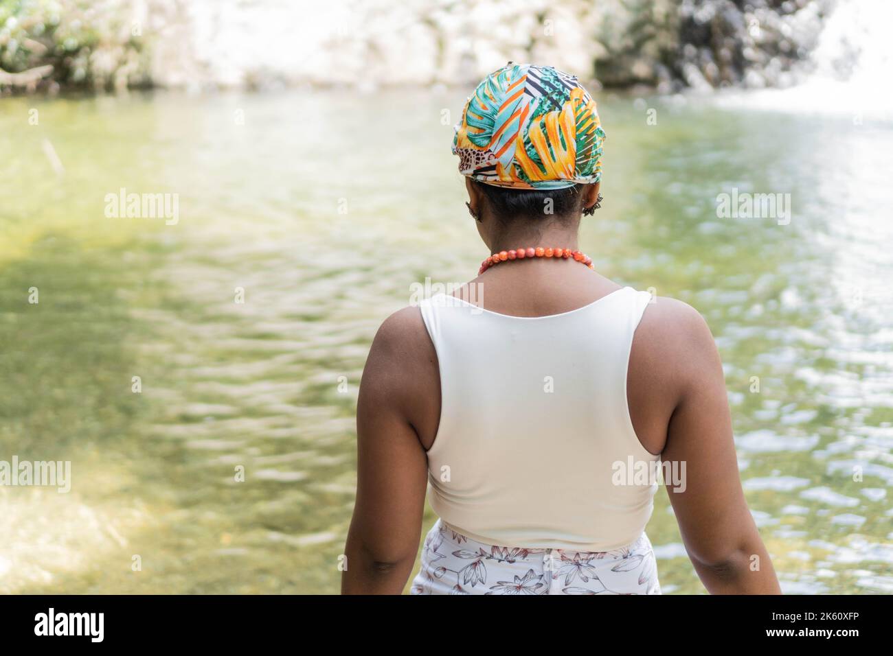 Portrait of a beautiful black woman on the river Stock Photo - Alamy