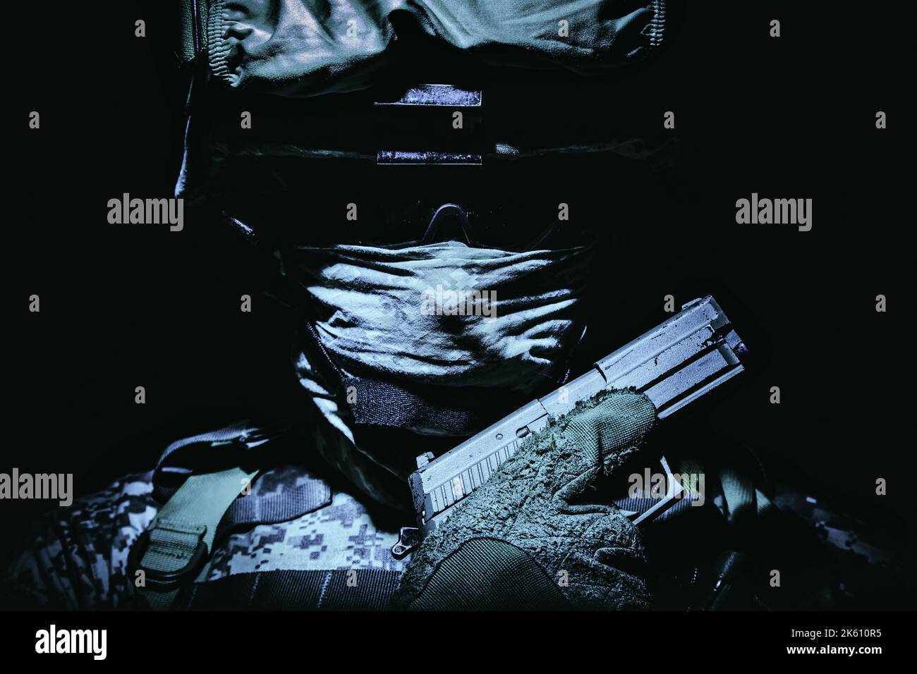 Special operations forces soldier in combat helmet with hidden behind