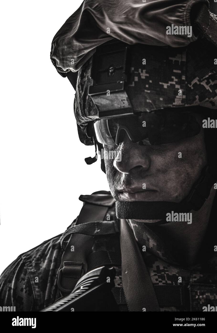 Shoulder portrait of modern army infantry soldier with dirty face in