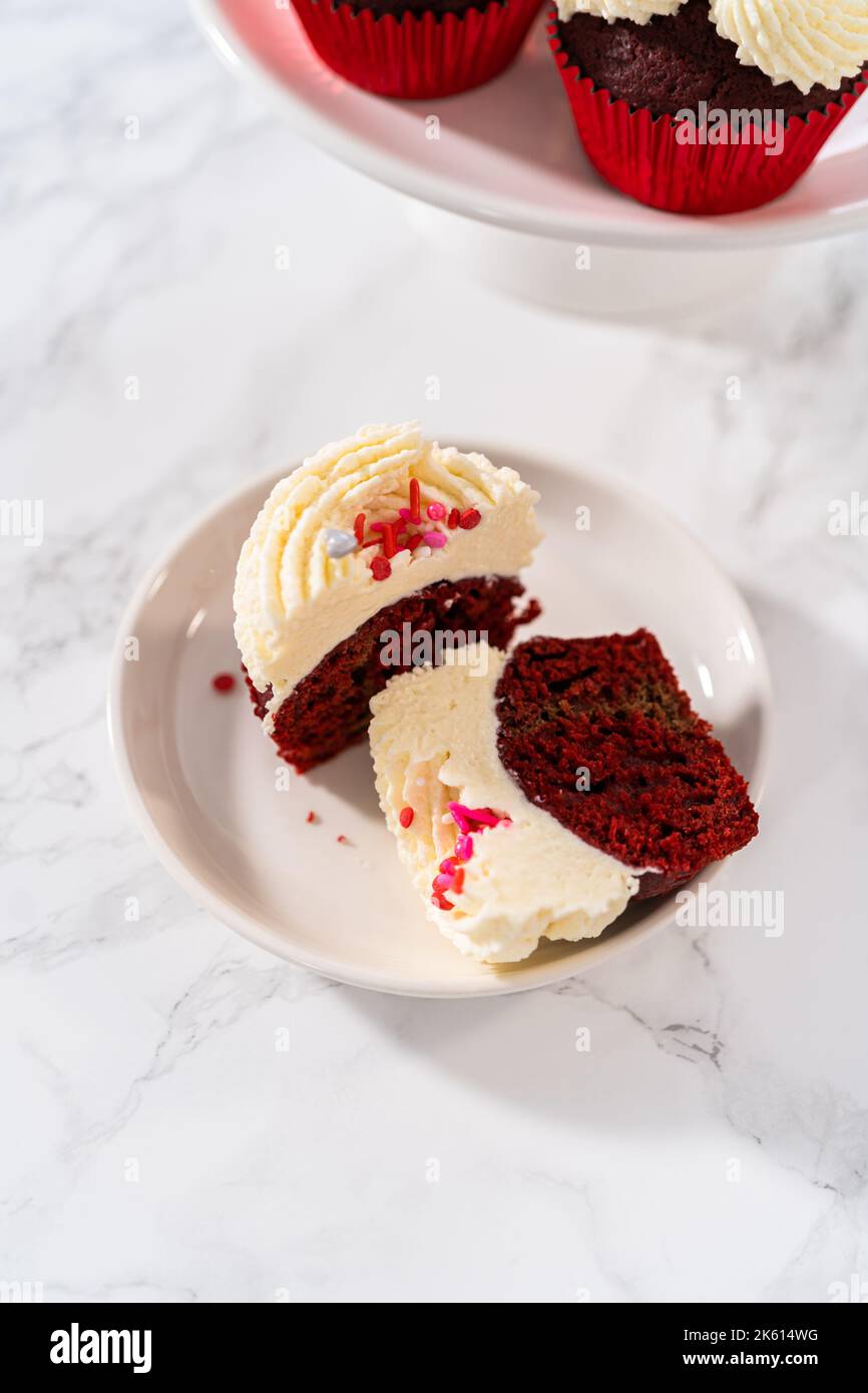 Red Velvet Cupcakes with White Chocolate Ganache Frosting Stock Photo Alamy