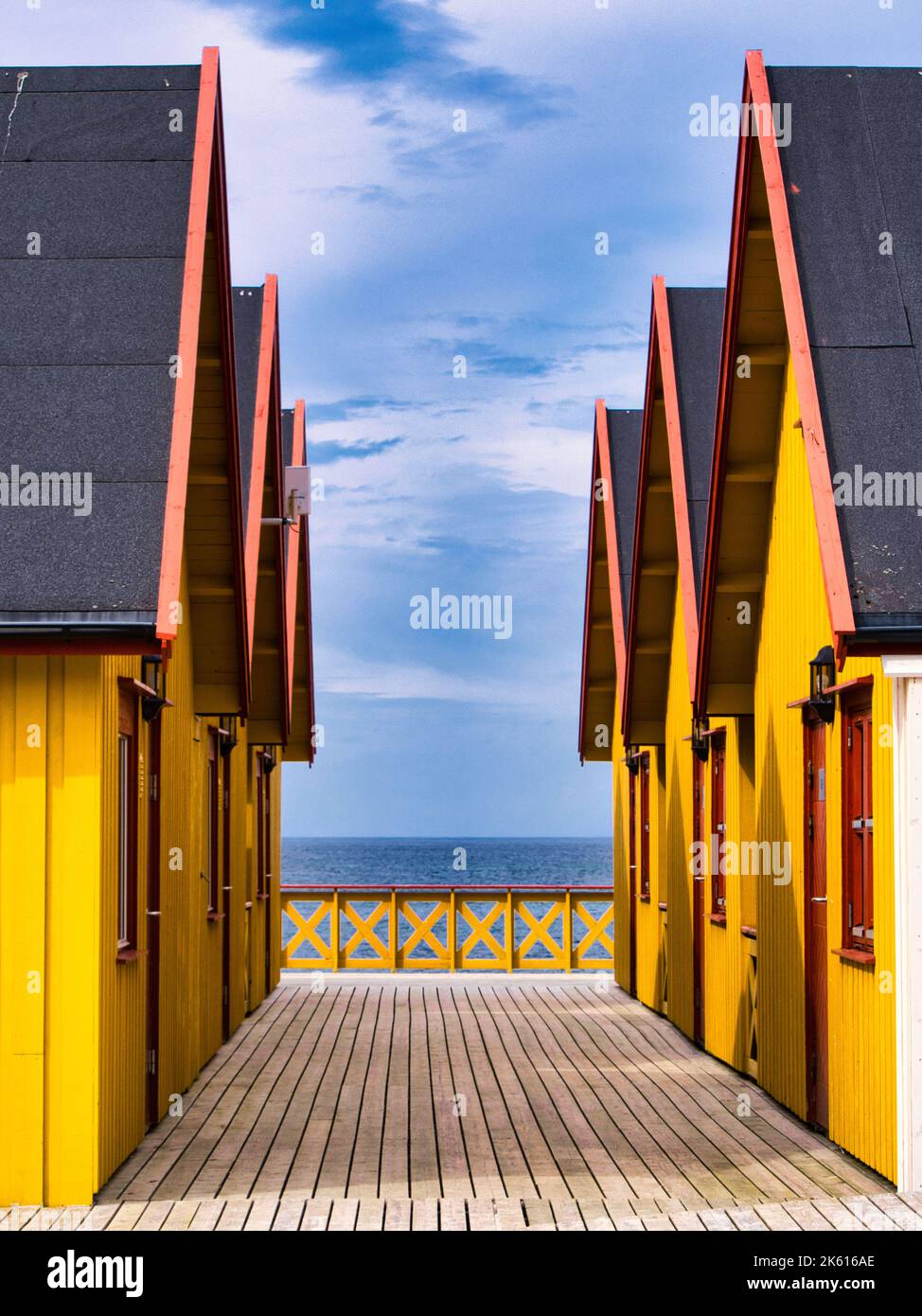 A vertical shot of the orange houses on the beach Stock Photo - Alamy