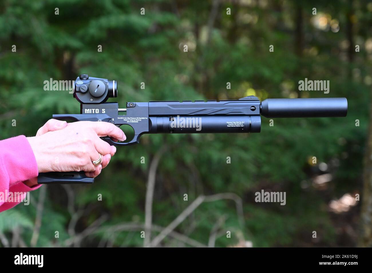 Horsham, West Sussex, UK October 11th 2022 A lady aiming and shooting