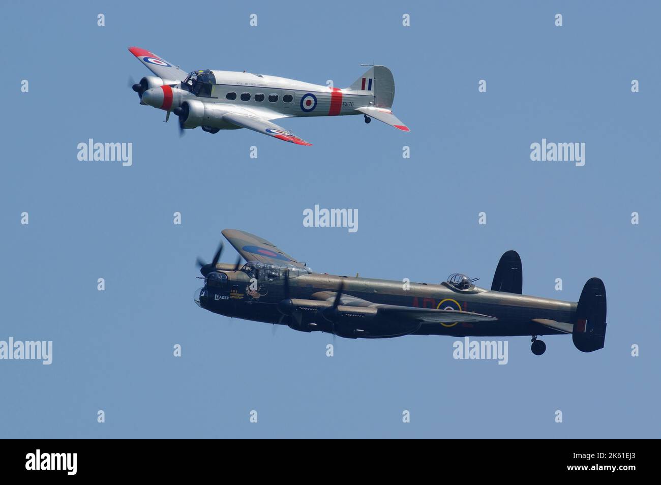 Avro Lancaster PA474 and Avro C19 G-AHKX, in formation at Old Warden, Biggleswade, Bedfordshire, England, United Kingdom, Stock Photo
