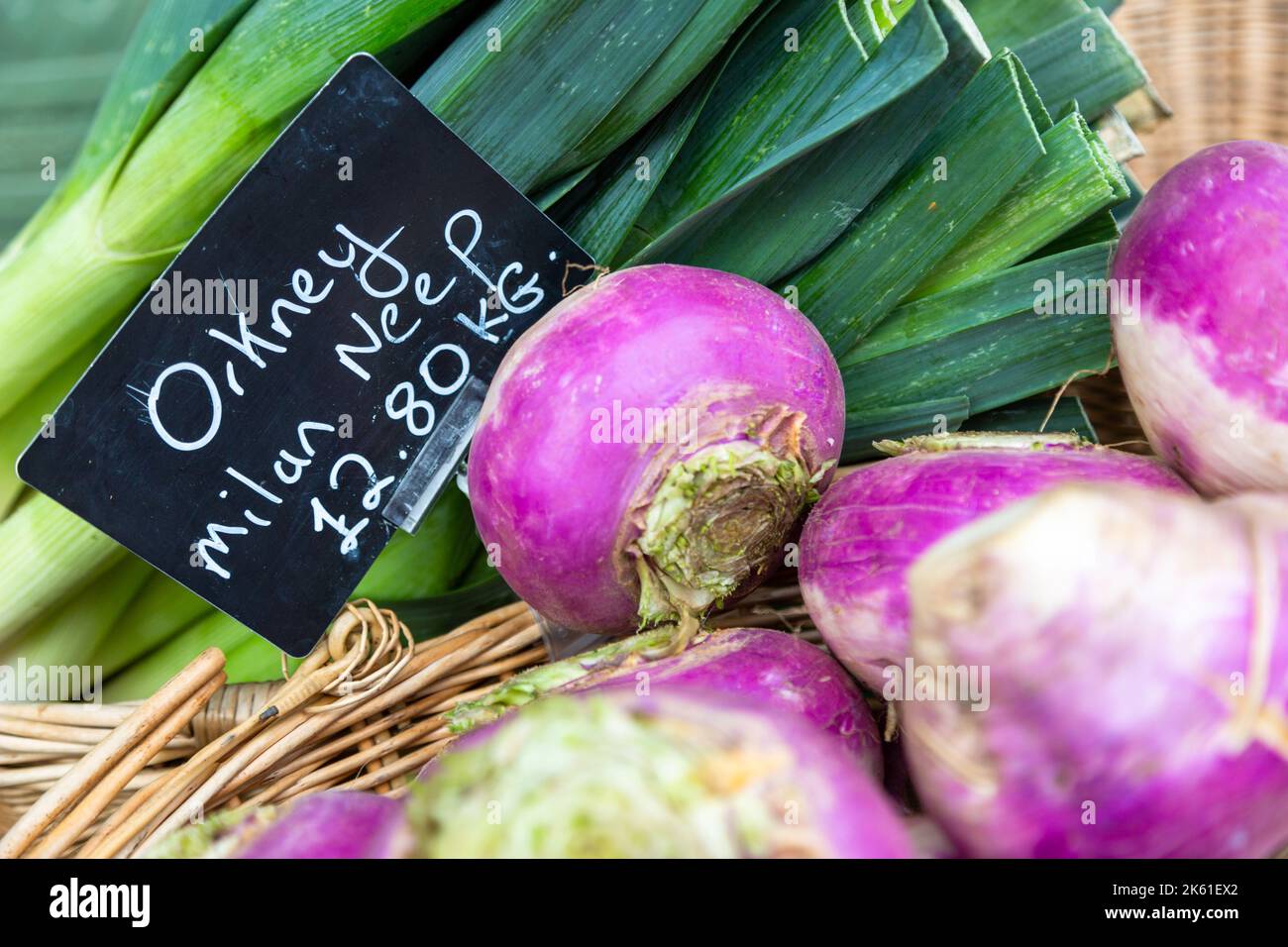 Orkney neeps and leeks on sale in a vegetable shop, close up Stock Photo