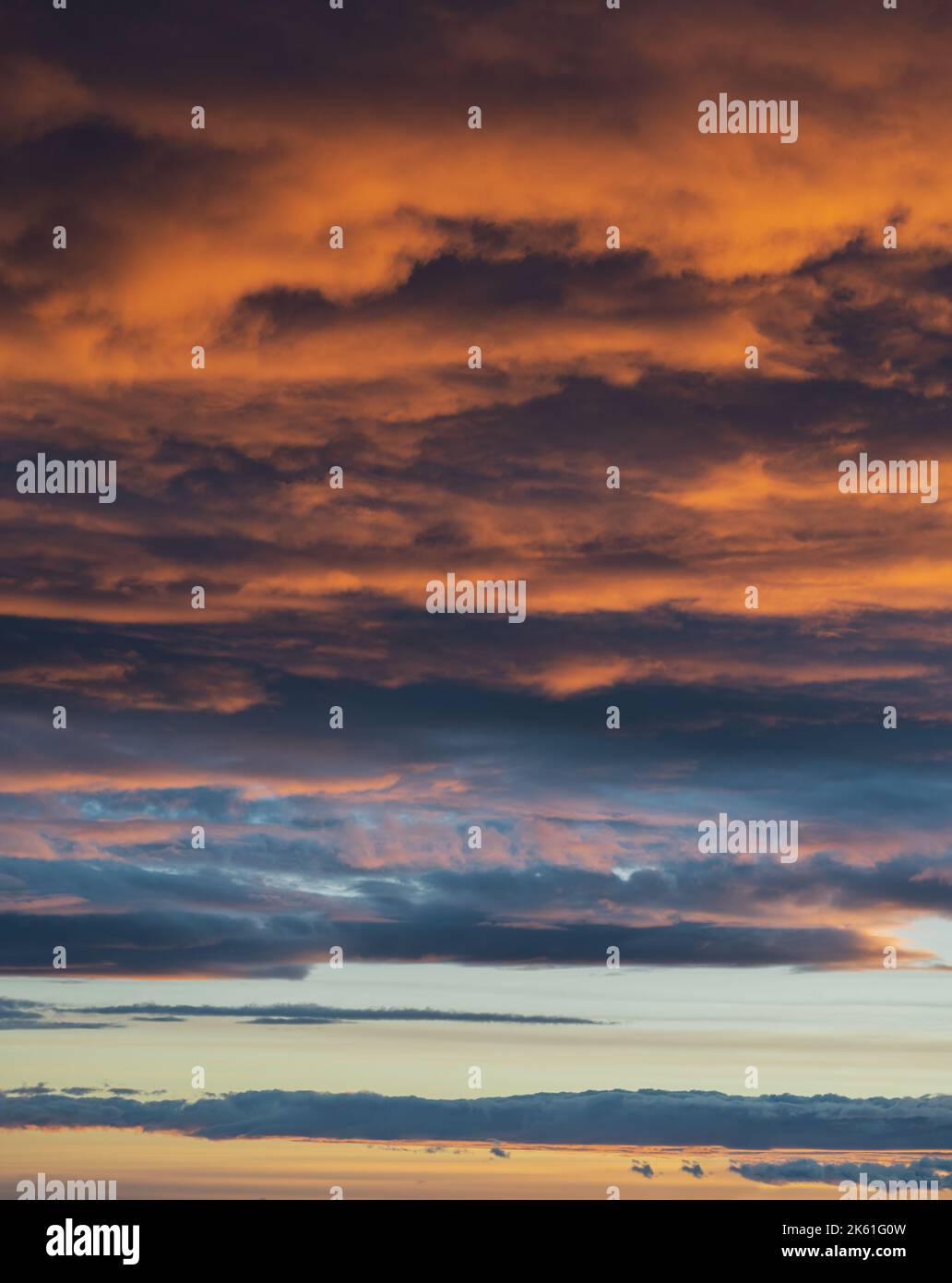 Sunset sky with orange clouds. Nature background Stock Photo - Alamy