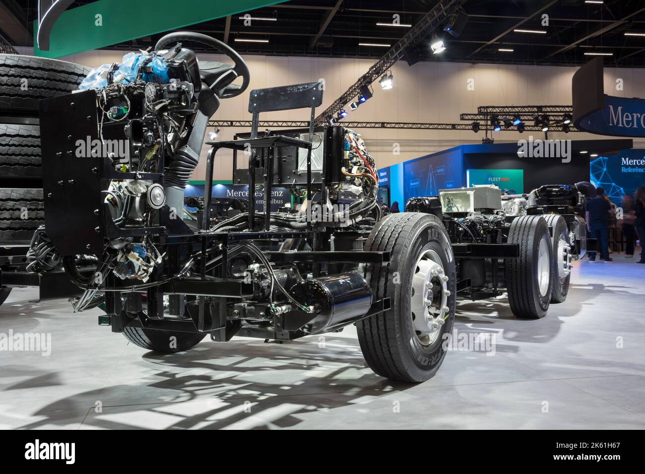 Exposed chassis, engine, gears and motor of a MercedesBenz bus on display at the LAT.BUS 2022