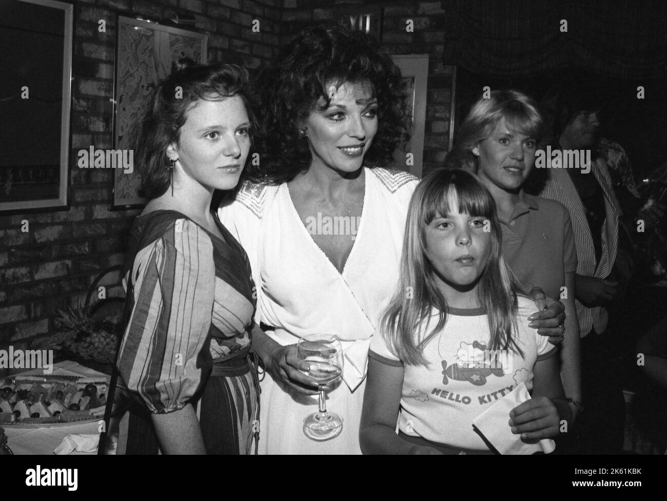 Joan Collins with daughter, Tara Newley and niece Katyana Kass at the Family Feud All-Star prime time special cocktail after party with actors from General Hospital, All My Children, Dynasty and Knott's Landing on July 25, 1982. Credit: Ralph Dominguez/MediaPunch Stock Photo