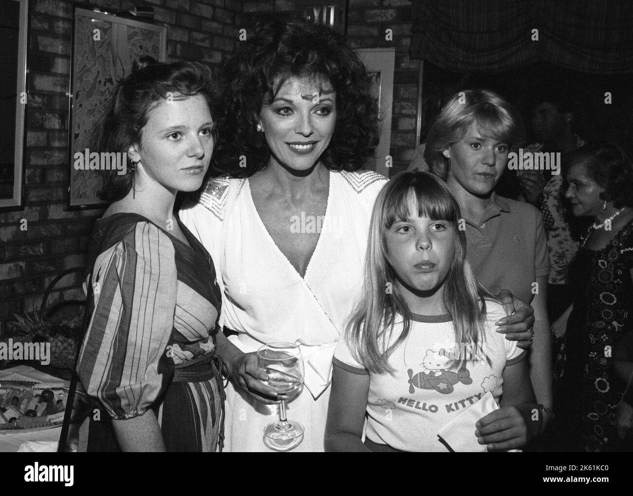 Joan Collins with daughter, Tara Newley and niece Katyana Kass at the Family Feud All-Star prime time special cocktail after party with actors from General Hospital, All My Children, Dynasty and Knott's Landing on July 25, 1982. Credit: Ralph Dominguez/MediaPunch Stock Photo