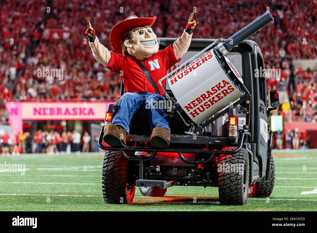 October 01, 2022 - Lincoln, NE. U.S. During a break in the action, Nebraska Cornhuskers mascot Herbie Husker rides around the field in a UTV during a NCAA Division 1 football game between Indiana Hoosiers and the Nebraska Cornhuskers at Memorial Stadium in Lincoln, NE. .Nebraska won 35-21.Attendance: 86,804.386th consecutive sellout.Michael Spomer/Cal Sport Media Stock Photo