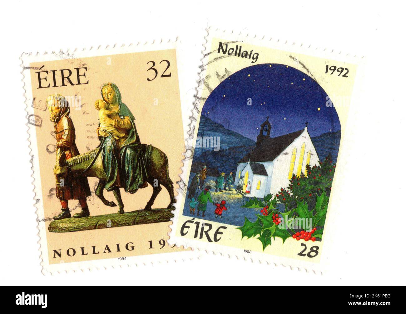 A montage of vintage Christmas stamps from Ireland on a white background. Stock Photo