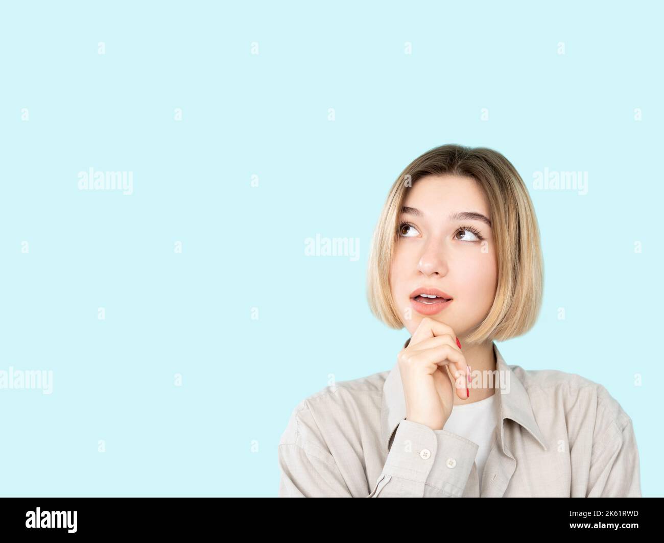 choose product puzzled woman proposition offer Stock Photo
