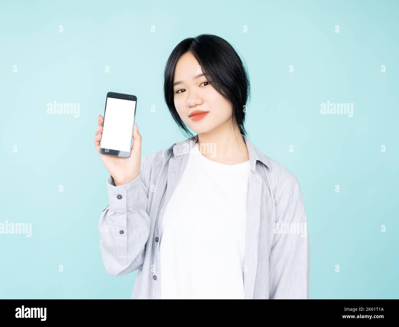 advertising information asian woman mobile Stock Photo