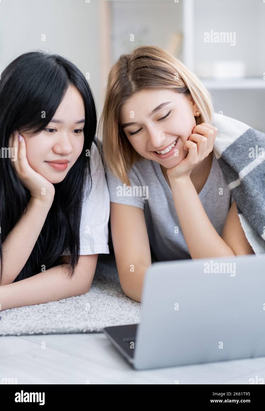 friendly homework happy women online education Stock Photo